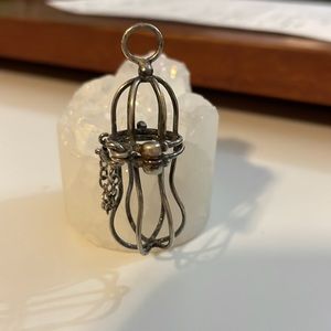 Hinged silver pendant